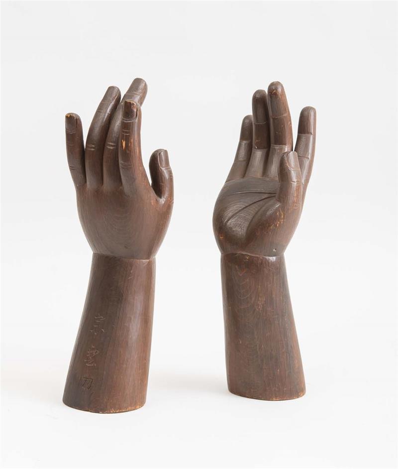 Appraisal: PAIR OF ASIAN CARVED WOOD HANDS PROBABLY JAPANESE Incised with