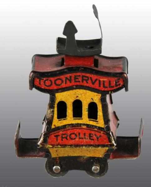 Appraisal: Tin Cracker Jack Toonerville Trolley Toy Description German Marked Copyright