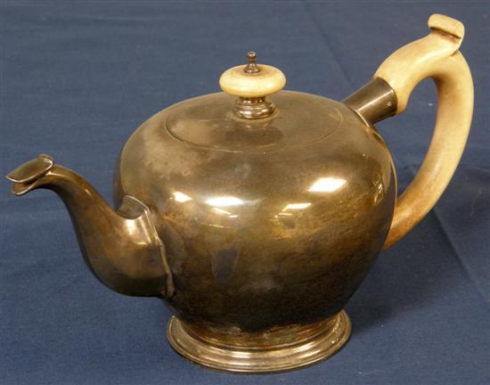 Appraisal: Modern silver round teapot with a scroll handle London oz