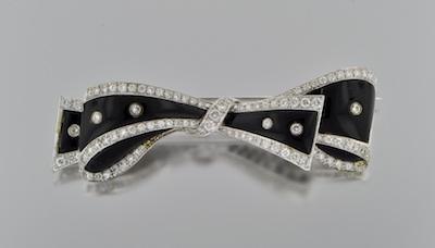 Appraisal: A Black Onyx and Diamond Bow Brooch k white gold