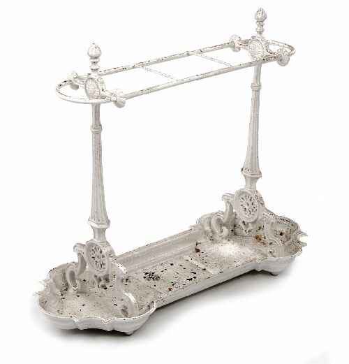 Appraisal: A Victorian cast iron stick stand white painted the rounded