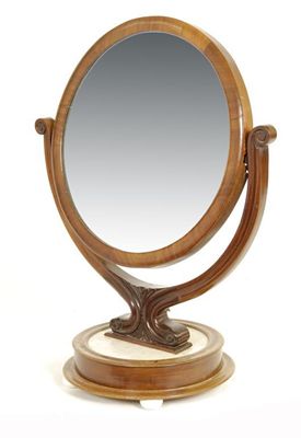 Appraisal: A Victorian mahogany circular toilet mirror on marble inset base