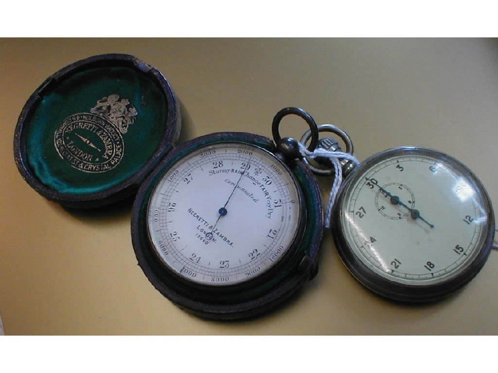 Appraisal: A cased Negretti Zambra pocket barometer together with an old