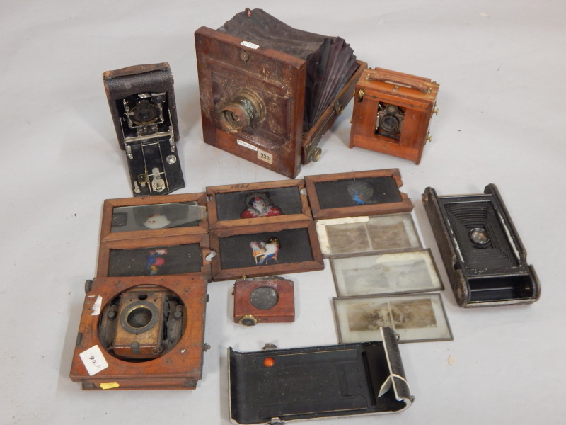 Appraisal: An International patent magic lantern various slides etc