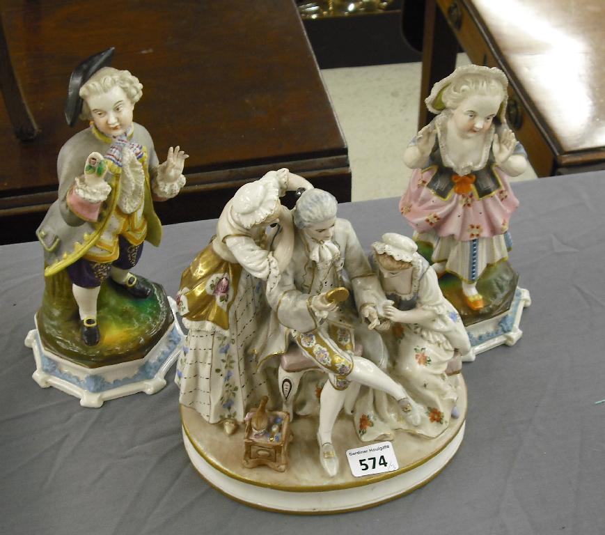 Appraisal: Continental porcelain group modelled with a seated gentleman attended by