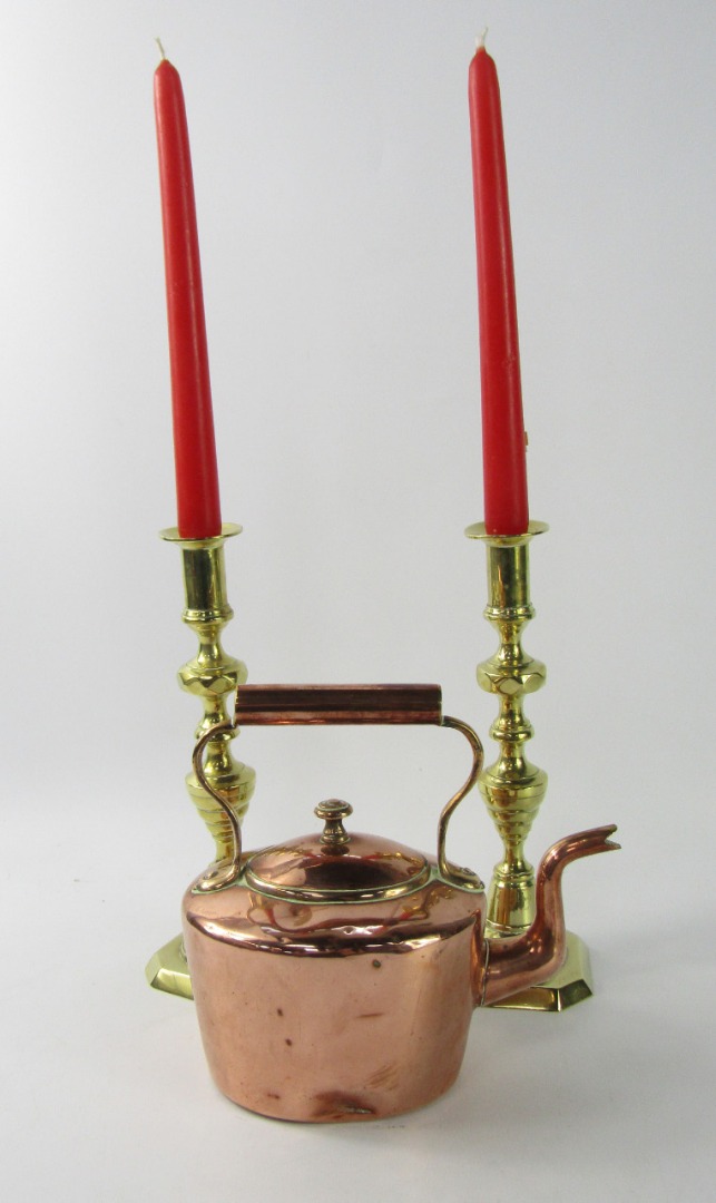 Appraisal: A pair of Georgian brass candlesticks cm high copper kettle