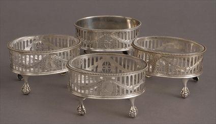 Appraisal: SET OF FOUR GEORGE III ARMORIAL SILVER OVAL SALTS Marks