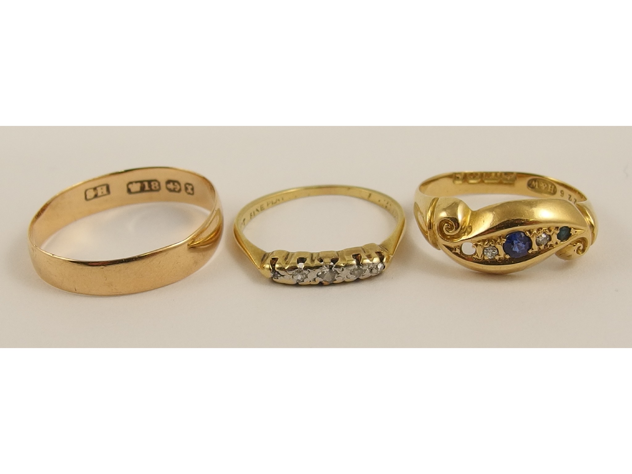 Appraisal: An ct wedding band and two further ct rings set