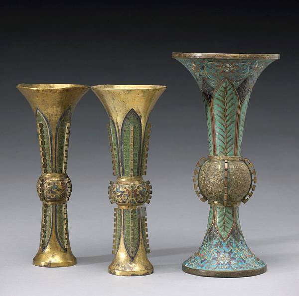 Appraisal: Three enameled metal archaistic gu form vases Each formed with