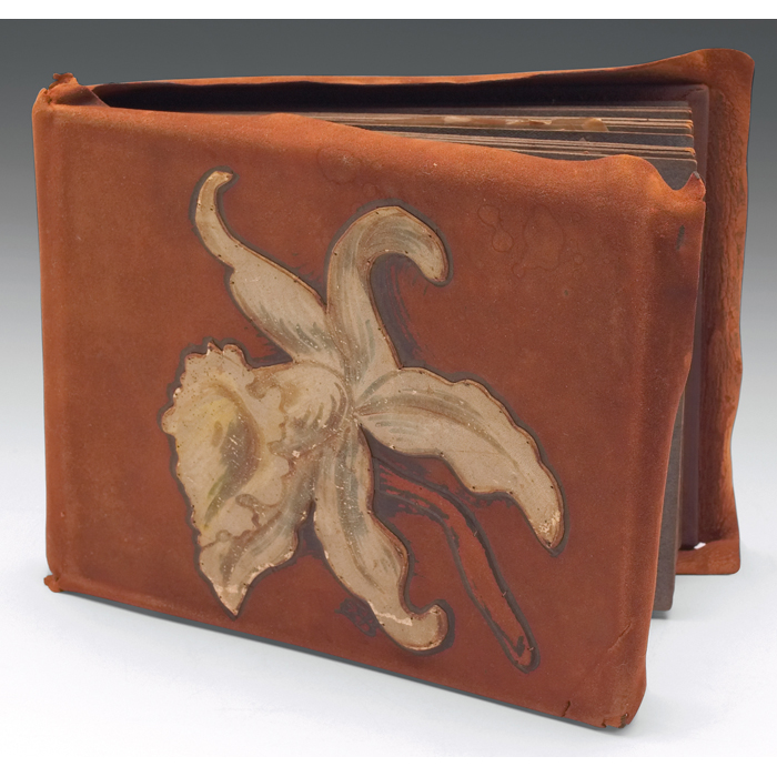 Appraisal: Elizabeth Eaton Burton postcard album handmade with a tooled leather