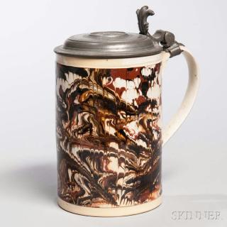 Appraisal: Creamware Quart Mug England c slip-marbled and combed ground attached