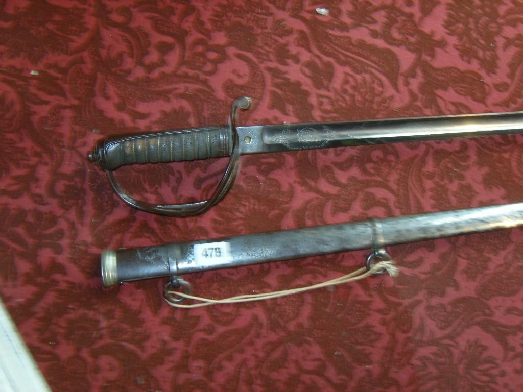 Appraisal: A Royal Artillery sword with pierced hilt and engraved decoration