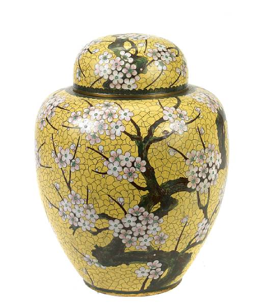 Appraisal: A yellow ground cloisonne enameled metal covered jar with prunus