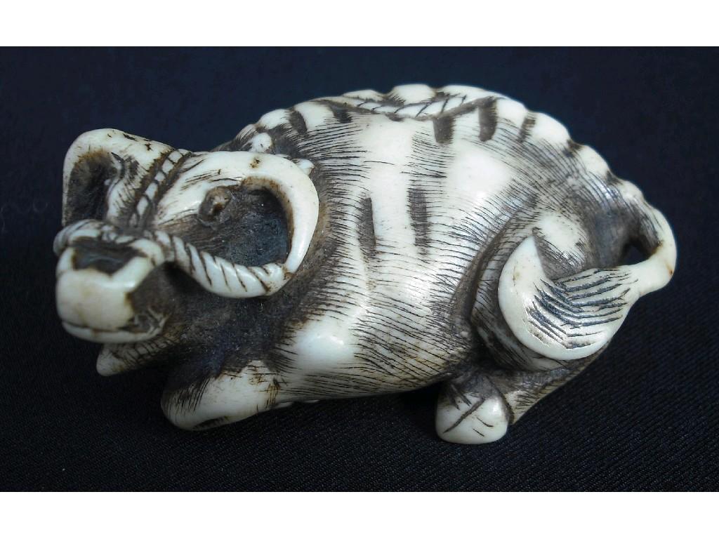 Appraisal: Carved ivory netsuke in the form of a recumbent water