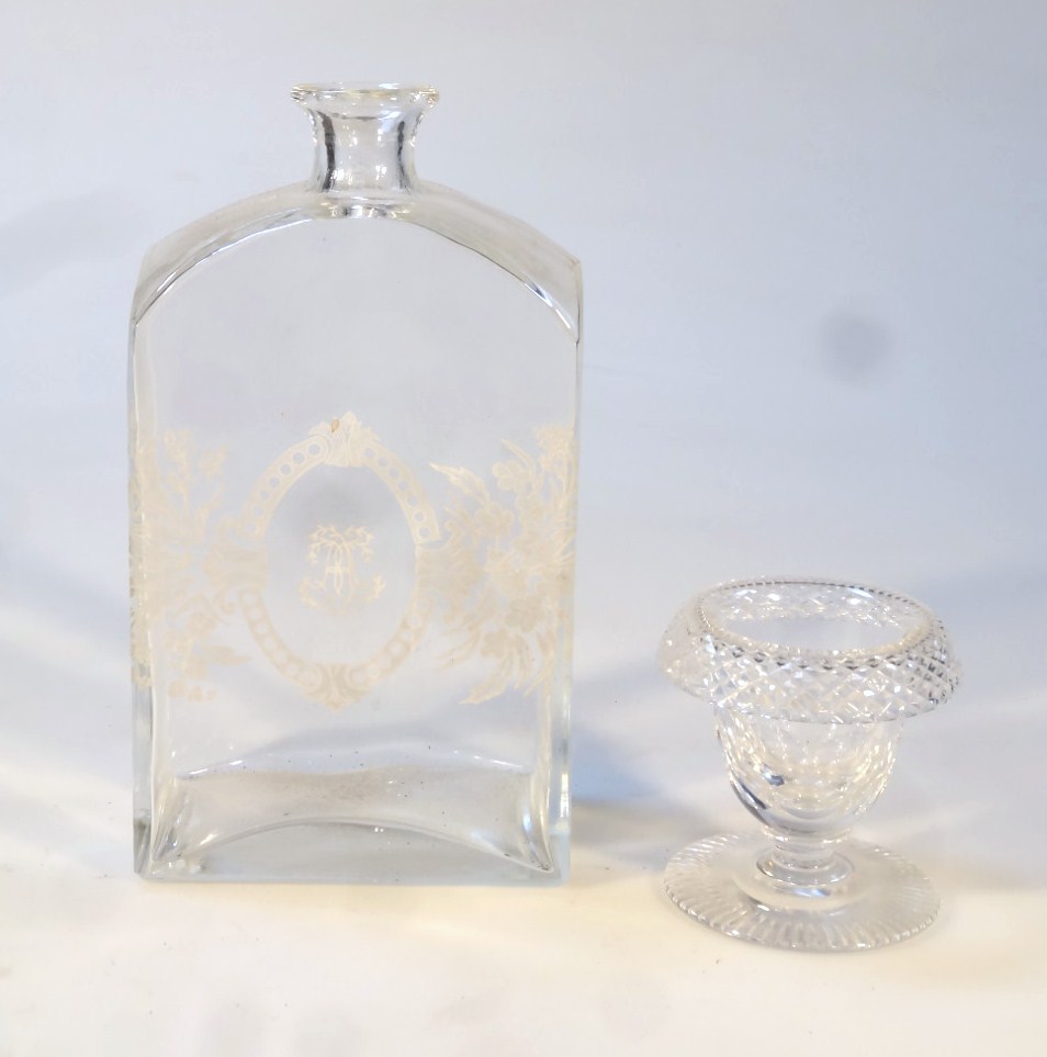 Appraisal: A glass decanter the shouldered body decorated with flowers centred