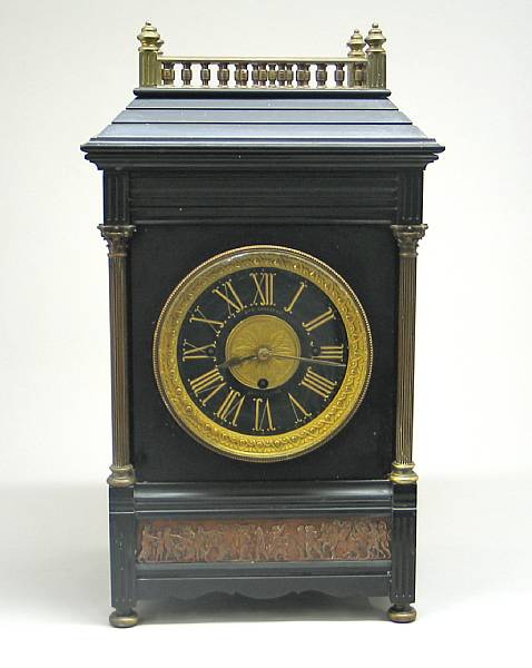 Appraisal: A Neoclassical style gilt and patinated bronze mounted black slate