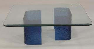 Appraisal: Large glass coffee table molded textured water glass bases in