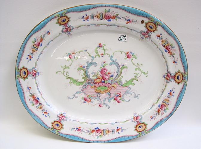 Appraisal: ENGLISH CAULDON OVAL PORCELAIN PLATTER with floral and scroll decorations