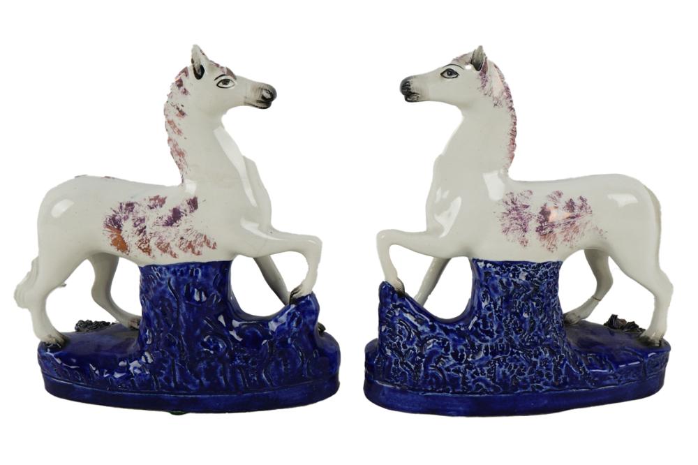 Appraisal: PAIR OF STAFFORDSHIRE HORSESCondition with repair to right hind leg