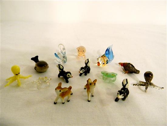 Appraisal: Miniature blown glass and porcelain figures including a whale pig