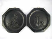 Appraisal: A pair of Russian octagonal wall plaques in a slate