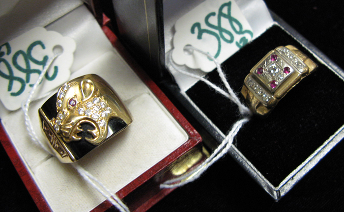 Appraisal: TWO MAN'S RUBY DIAMOND AND FOURTEEN KARAT GOLD RINGS each