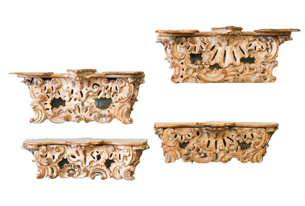 Appraisal: SET OF FOUR ROCOCO-STYLE CARVED WOOD BRACKETS th century with