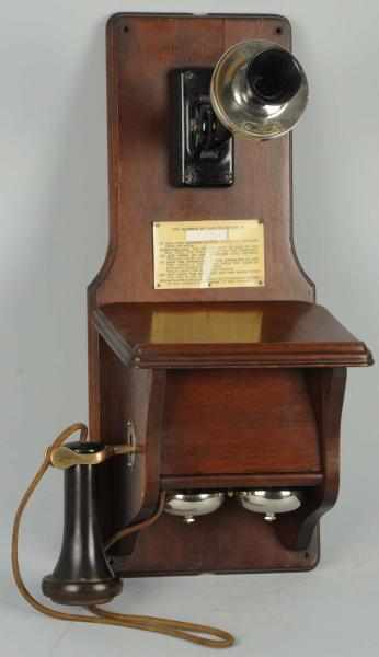 Appraisal: Western Electric A Fiddleback Wall Telephone Circa walnut W faceplate