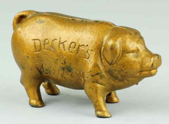 Appraisal: DECKERS IOWANA PIG STILL BANK Cast iron painted in gold