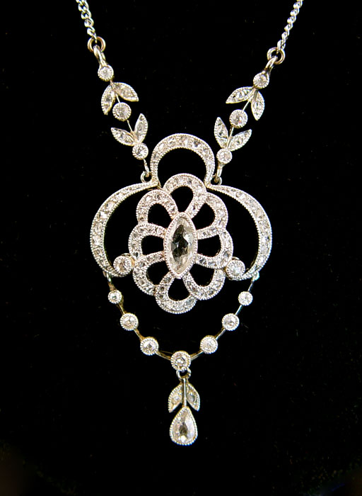 Appraisal: EDWARDIAN PLATINUM AND DIAMOND LAVALIER NECKLACE Platinum necklace contains round