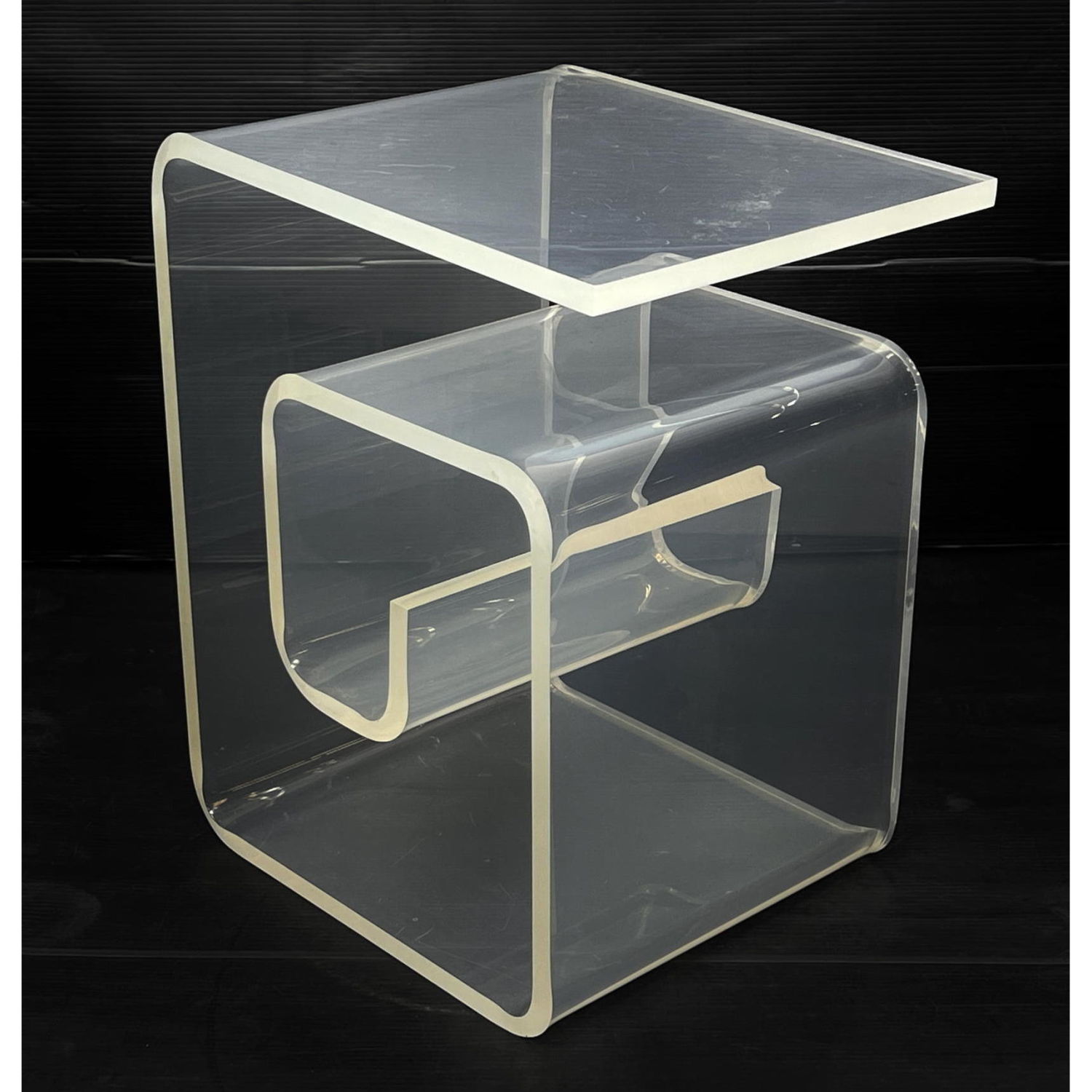 Appraisal: Snail Form Molded Lucite Side End Table Turn on Side