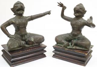 Appraisal: Pair Southeast Asian Demon Figures on Wood Bases Incised bronze