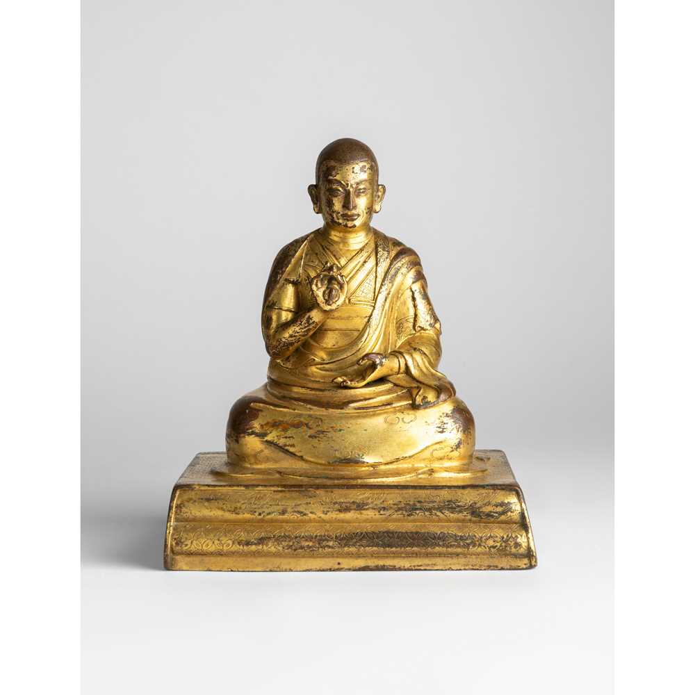 Appraisal: GILT BRONZE SEATED FIGURE OF A LAMA QING DYNASTY TH