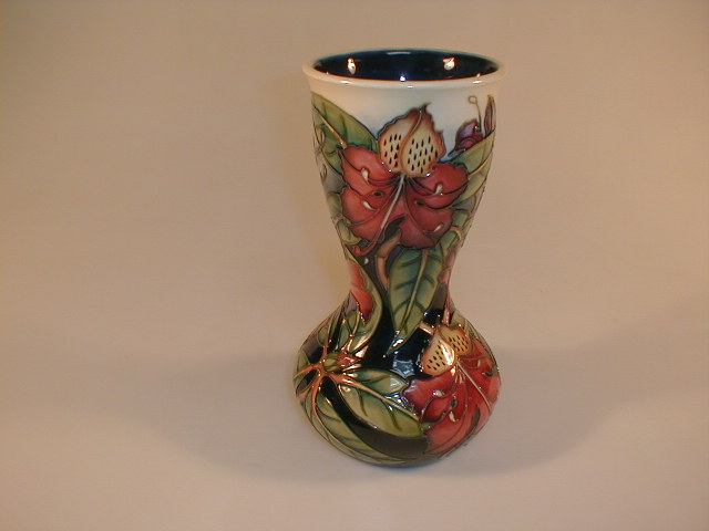 Appraisal: A modern Moorcroft waisted vase with tiger lily and leaf