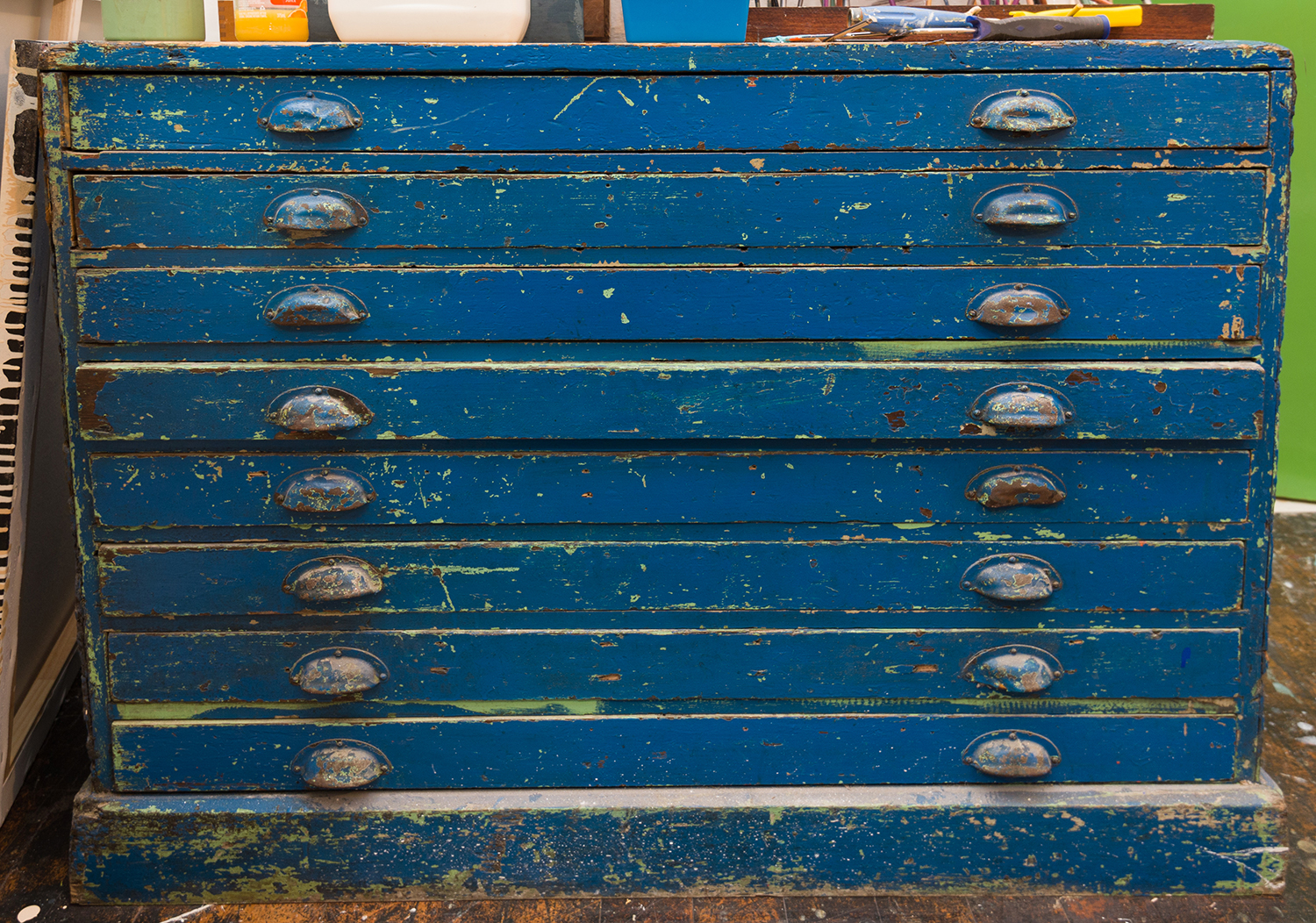 Appraisal: A RUSTIC BLUE PAINTED EIGHT DRAWER PLAN CABINET h x