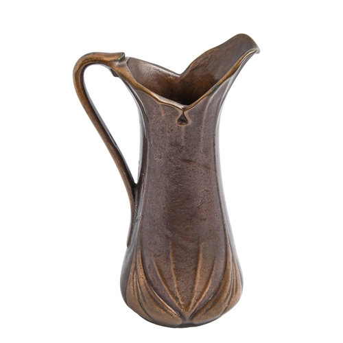 Appraisal: A naturalistic bronze jug th c cast with overlapping leaves