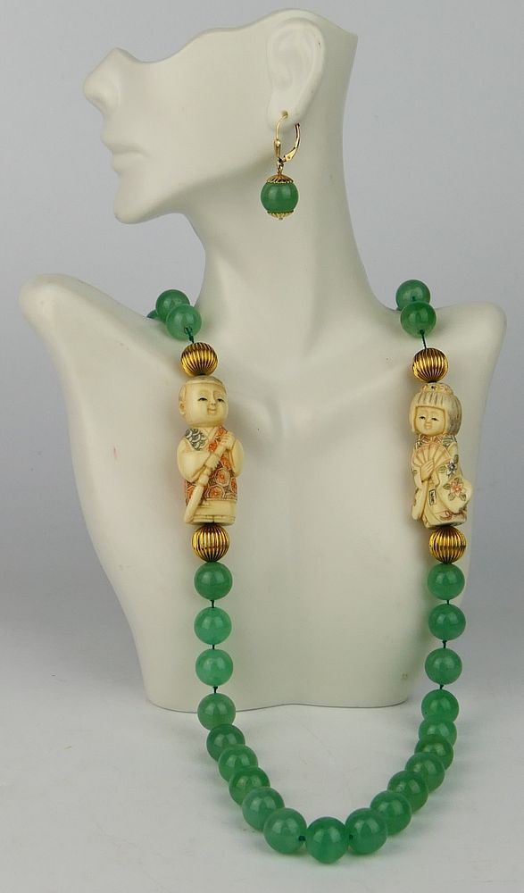 Appraisal: CHINESE JADEITE KT Y GOLD NETSUKE JEWELRY SUITE Fabulous vintage