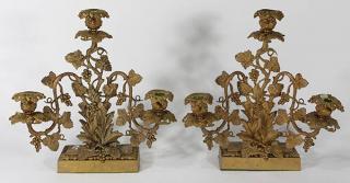 Appraisal: Pair of Classical gilt metal candelabra Pair of Classical gilt