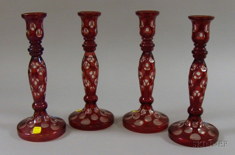 Appraisal: Set of Four Ruby Flash Cut to Clear Glass Candlesticks