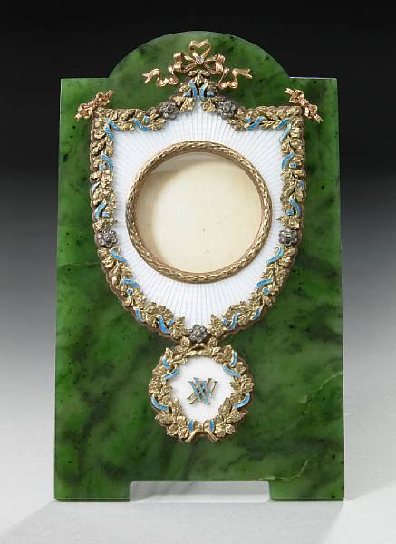 Appraisal: A nephrite guilloche enamel and gold photograph frame early th