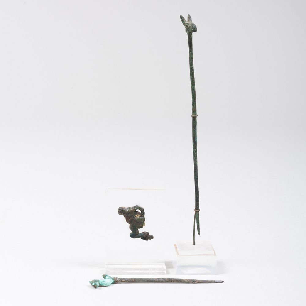 Appraisal: Three Metal Artifacts Comprising A Incan metal figural tool on