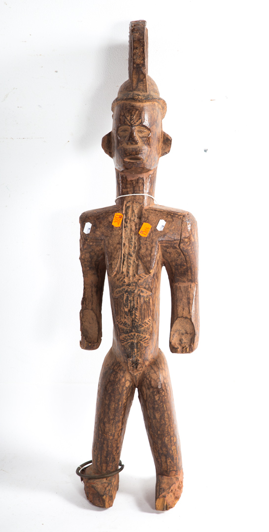 Appraisal: Ibo wood standing figure with tall coiffure crest and metal