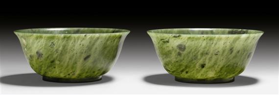 Appraisal: A PAIR OF SPINACH GREEN JADE BOWLS China Qing dynasty