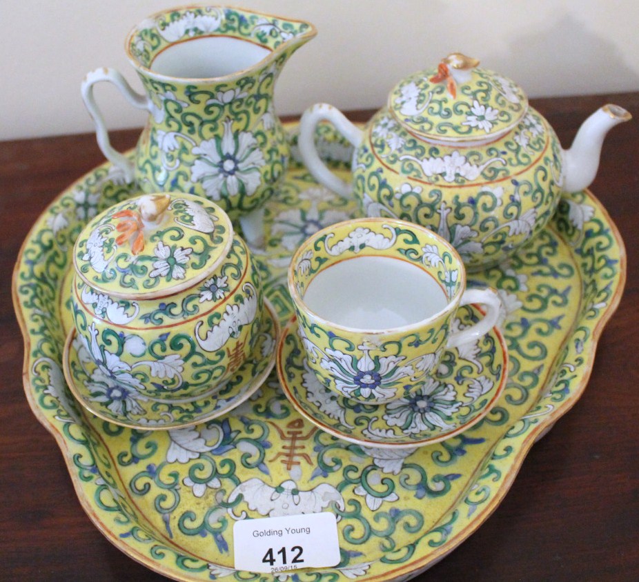 Appraisal: A thC Chinese famille jeune tea set comprising trefoil enamelled