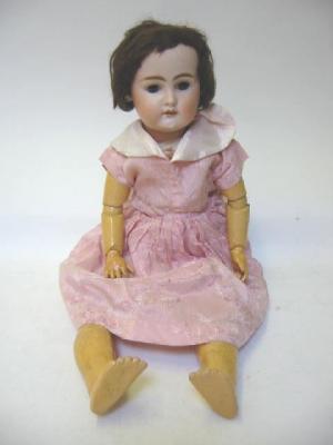 Appraisal: A Simon Halbig bisque head girl doll with fixed brown