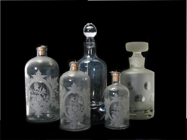 Appraisal: Group of antique glass stoppered bottles one with paperweight bottom