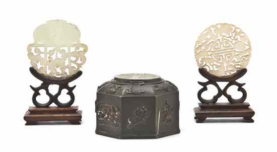 Appraisal: A Group of Three Jade Roundels having pierced carving one