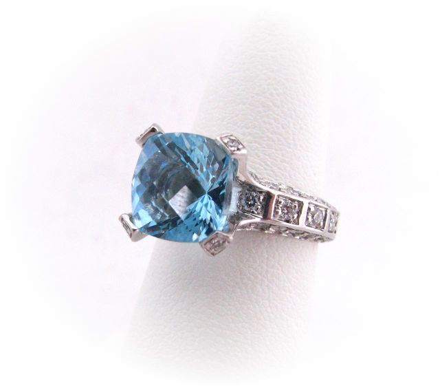 Appraisal: Aquamarine and diamond lady's ring with approximately ct cushion cut