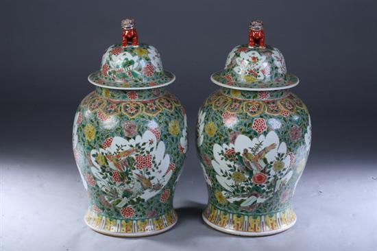 Appraisal: LARGE PAIR FAMILLE VERTE PORCELAIN JARS AND COVERS Guangxu period