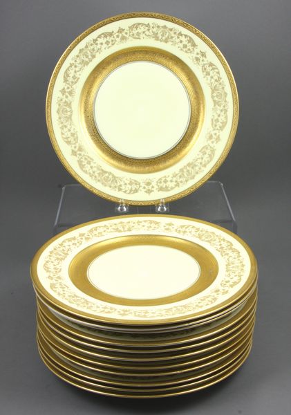 Appraisal: Set of twelve German porcelain plates with k gold trim